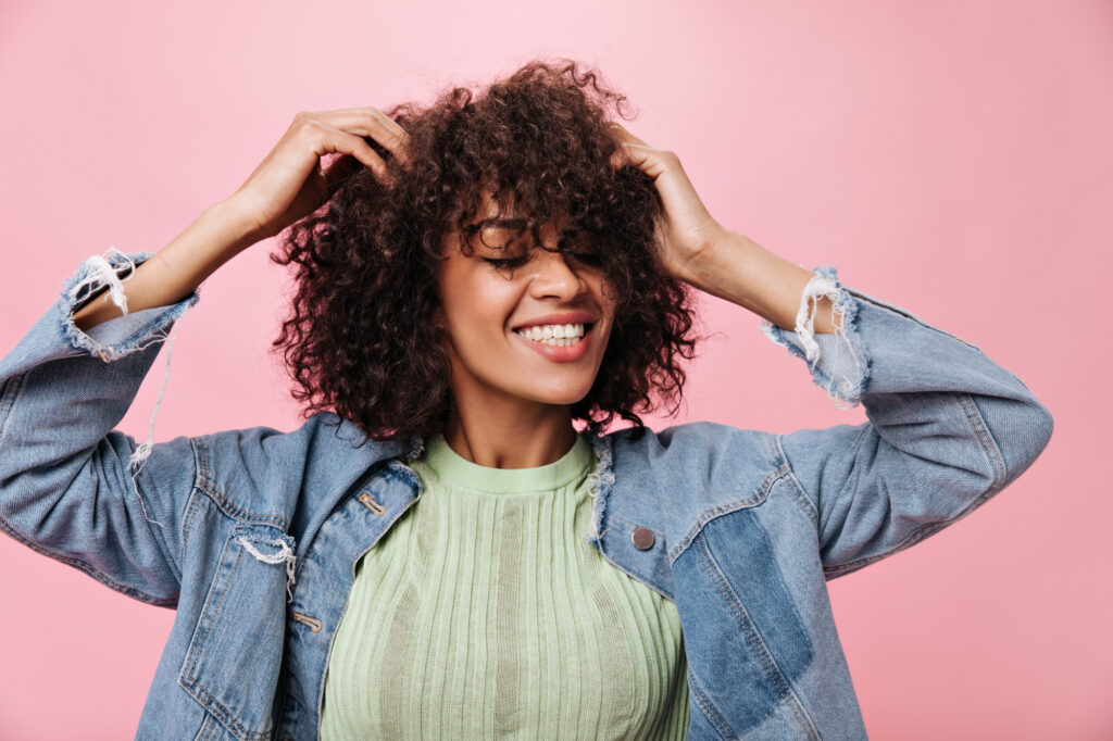 Curly hair styled with curl-specific products